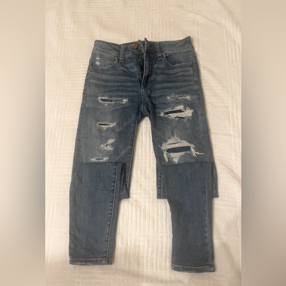American Eagle Hi Rise Ripped Skinny Jean with Patches and Pockets